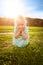 Adorable blond little girl with cheeky smile