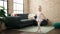 Adorable blonde girl ballerina smiling confident dancing at home