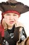 Adorable boy in pirate costume