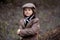 Adorable boy on a railway station, waiting for the train