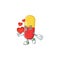 An adorable cartoon design of red yellow capsules holding heart