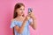 Adorable caucasian teen girl use smartphone