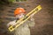 Adorable Child Boy with Level Playing Handyman Outside