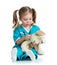 Adorable child with clothes of doctor examining hare toy over white