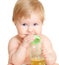 Adorable child drinking from bottle