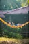 Adorable child lying in an orange hammock enjoying the sunshine of a Southeast Asian island