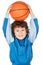 Adorable child playing the basketball