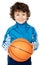 Adorable child playing the basketball