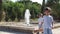 Adorable children siblings watching the fountain,Toddlers brother walking camera