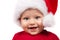 Adorable christmas child in a red hat