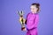 Adorable cup winner. Small girl holding silver cup. Little child with cup shaped sports trophy. Cute athlete being