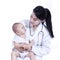 Adorable doctor with a baby in her arms - isolated