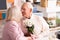 Adorable elderly couple kissing