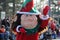 Adorable elf walking through crowds, waving hello, Annual Holiday Parade,Glens Falls,New York,2014