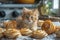 Adorable Fluffy Ginger Kitten Amid Freshly Baked Golden Pastry Rolls on Kitchen Counter