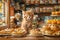 Adorable Fluffy Ginger Kitten Surrounded by Fresh Baked Goods in Cozy Bakery Environment