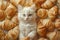 Adorable Fluffy White Kitten Surrounded by Golden Baked Croissants on a Light Background