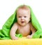 Adorable happy baby in colorful towel