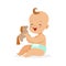 Adorable happy baby in a diaper sitting and playing with toy horse, colorful cartoon character vector Illustration