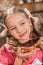 adorable happy little girl eating toast