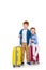 adorable happy redhead children with suitcases smiling at camera