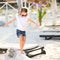 Adorable happy smiling little girl on beach