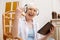 Adorable hilarious elderly woman enjoying cool song
