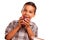 Adorable Hispanic Boy Eating a Large Red Apple