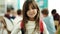 Adorable hispanic girl student smiling confident standing at classroom