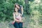 Adorable lesbian couple with their baby girl in nature.