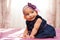 Adorable little african american baby girl looking - Black people