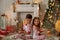 Adorable little girl and boy in Christmas time