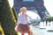 Adorable little girl in Paris background the