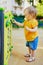 Adorable little girl on playground on a sunny day