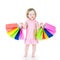 Adorable little girl after sale with her colorful bags