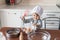 adorable little kid in chef hat with whisk