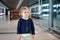 Adorable little toddler girl at the airport. Lovely child walking to the gate and going on family vacations by plane