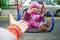 adorable little toddler swinging on a swing in the playground