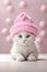 Adorable little white fluffy cat with pink hat wallpaper, animal background, banner with copy space text