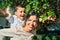 Adorable mother and son smiling happy on piggyback at the city