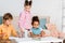 adorable multiethnic children drawing and