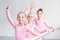 adorable multiethnic kids practicing ballet and smiling at camera