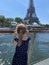 Adorable preschooler girl anjoying the view from tourist boat floating on Seine in Paris