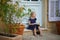 Adorable preschooler girl walking on a street of Medieval village of Lourmarin in Southern France