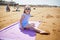 Adorable preshooler girl playing on the sand beach at Atlantic coast of Brittany, France