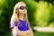 Adorable preteen girl wearing sunglasses on sunny summer day