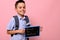 Adorable schoolboy with backpack holds chalkboard with chalk lettering ,Back to school, and cute smiles to camera, isolated over