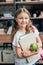 adorable schoolgirl with apple