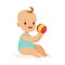 Adorable smiling baby sitting and playing with a ball, colorful cartoon character vector Illustration