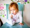 Adorable Toddler Girl Brushes Her Teeth in Pajamas. Health Care concept.